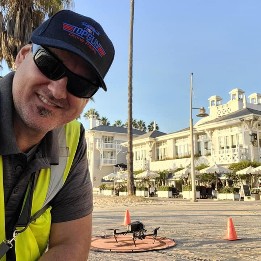 John Johnson, Top Gun Drone Pilots owner, operating a drone on a Southern California beach