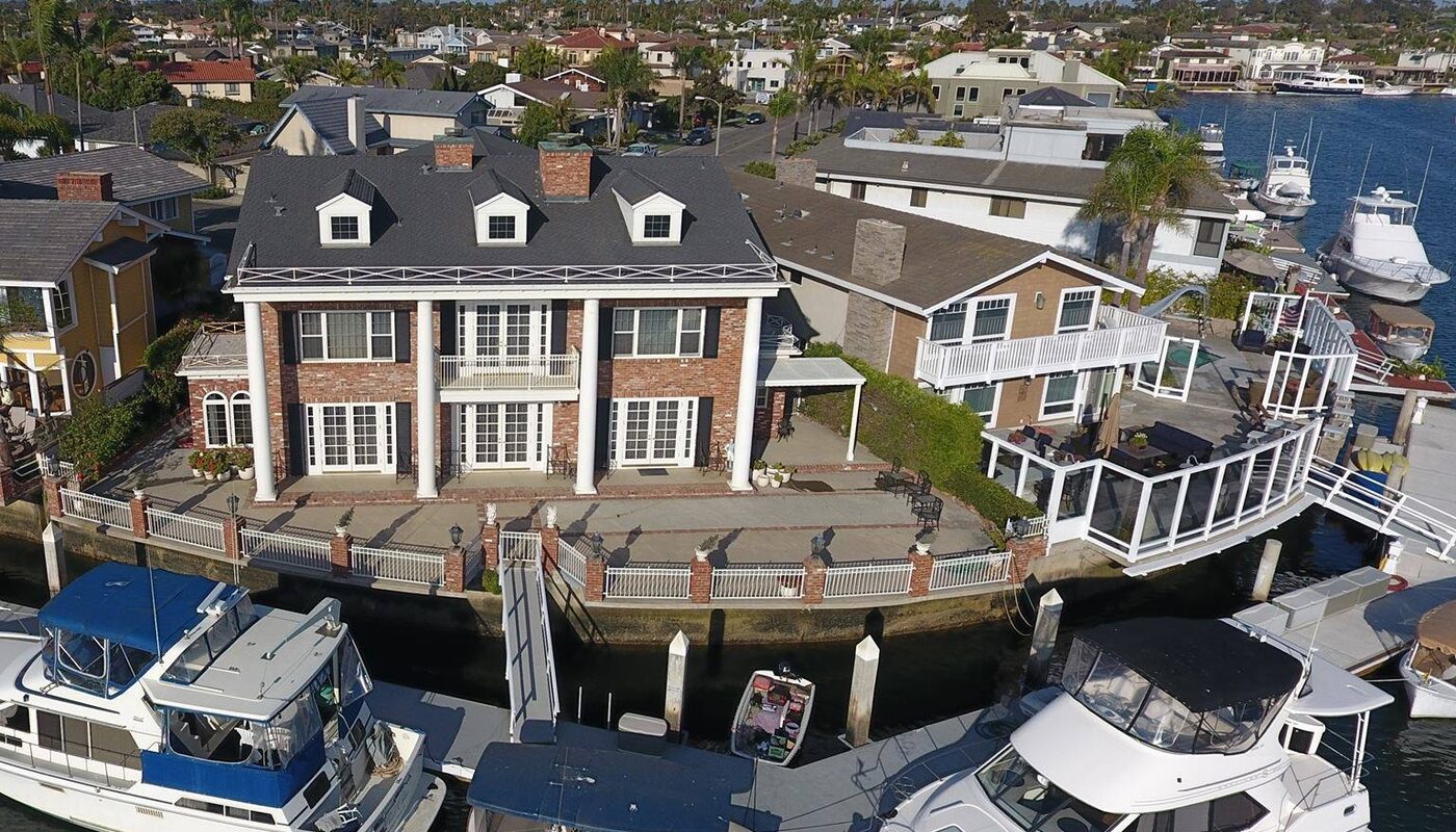 Canal waterfront home aerial photography Huntington Beach